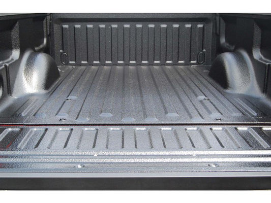 DIY spray-in bed liner kit applied to truck bed