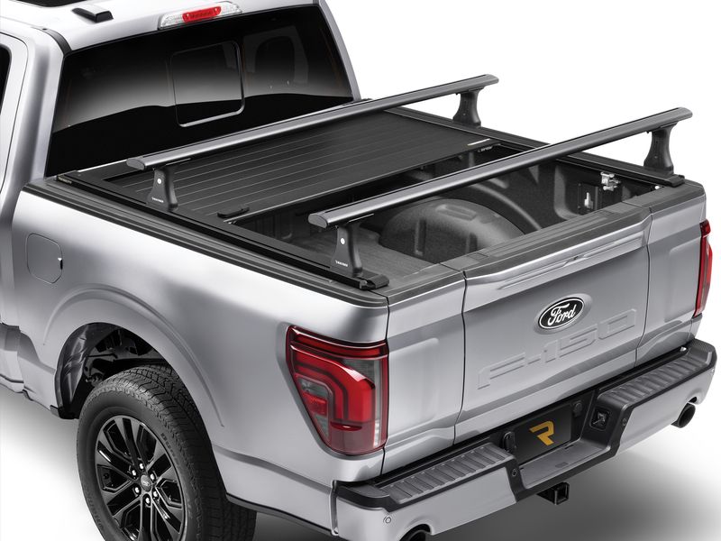 RetraxPRO XR retractable tonneau cover with T-slot rails on truck