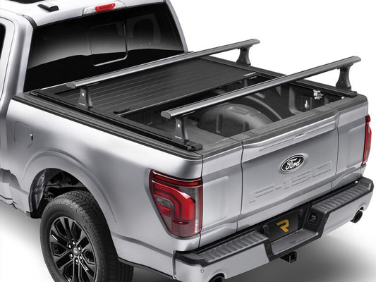 RetraxPRO XR retractable tonneau cover with T-slot rails on truck